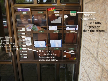 An image of the mailboxes and doorbells of the apartment that sits above the so-called "Patio Tomb" in East Talpiot, Jerusalem. Note the different shade of green, typeset/font of the inscribed letters on mailbox 4 in comparison to the other signs. Note also the color of the slightly greener sign next to the doorbells.